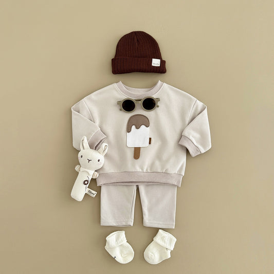 Baby outfit set with a shirt featuring a cute ice cream design and comfy pants, available in various colors for playful and comfortable everyday wear.